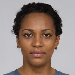 Neutral black young-adult female with short  brown hair and brown eyes