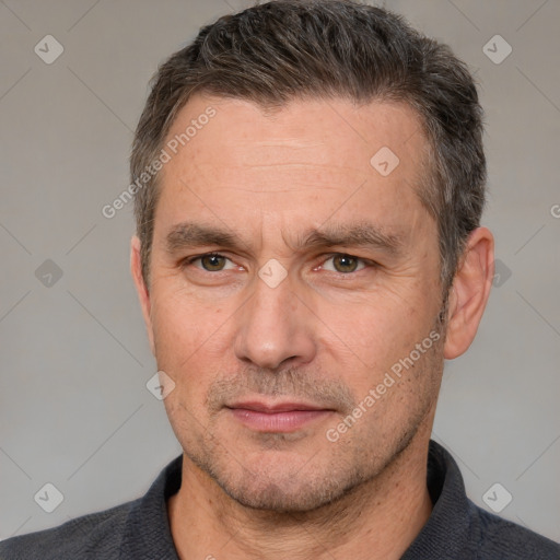 Neutral white adult male with short  brown hair and brown eyes