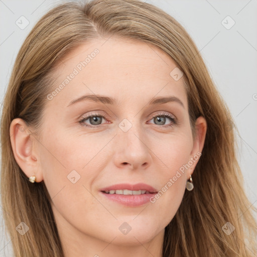 Joyful white young-adult female with long  brown hair and blue eyes