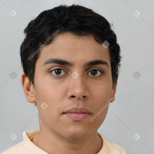 Neutral latino young-adult male with short  brown hair and brown eyes