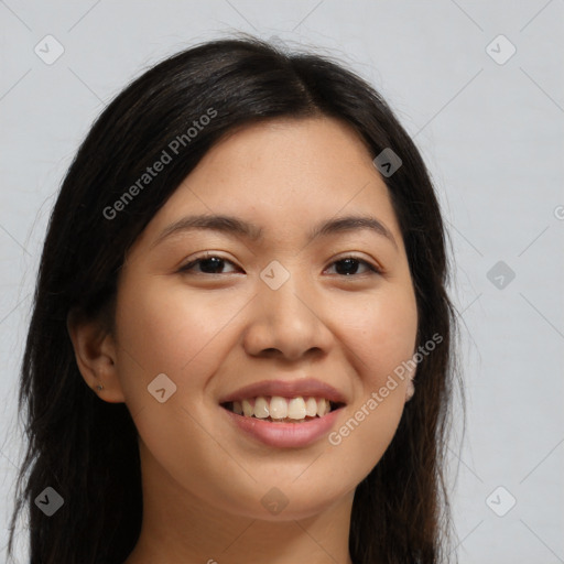 Joyful asian young-adult female with long  brown hair and brown eyes