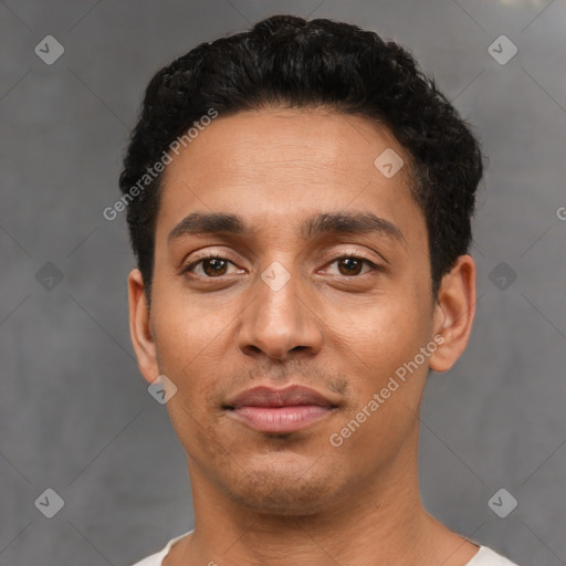 Neutral latino young-adult male with short  black hair and brown eyes