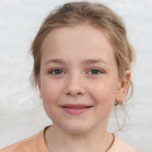 Joyful white child female with medium  brown hair and grey eyes