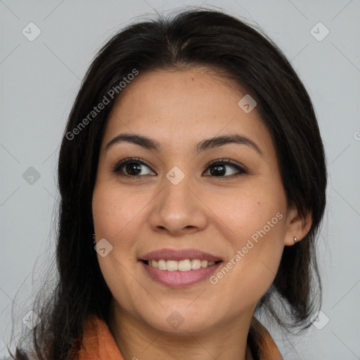 Joyful asian young-adult female with long  brown hair and brown eyes