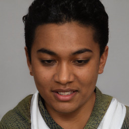 Joyful latino young-adult female with short  brown hair and brown eyes