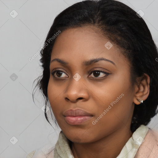 Joyful black young-adult female with medium  black hair and brown eyes