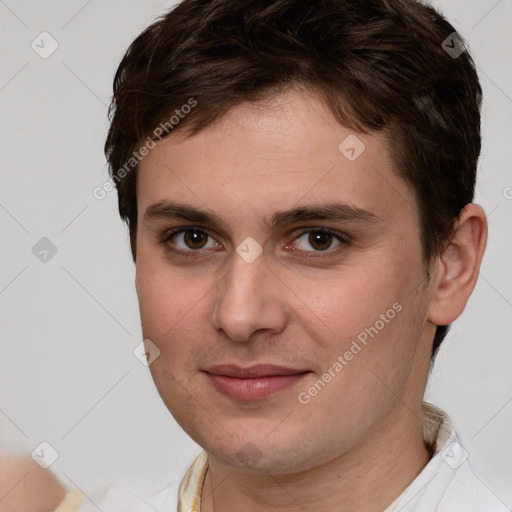 Joyful white young-adult male with short  brown hair and brown eyes