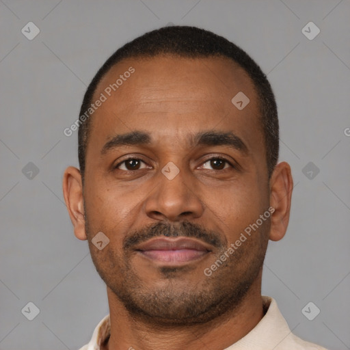 Neutral latino young-adult male with short  brown hair and brown eyes