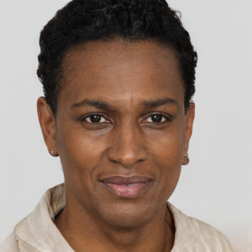 Neutral black adult female with short  black hair and brown eyes