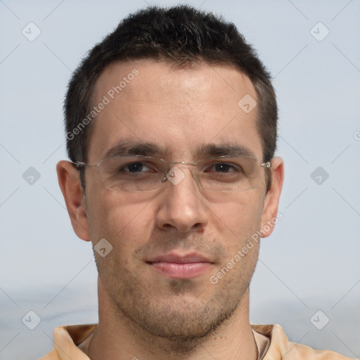 Joyful white adult male with short  brown hair and brown eyes