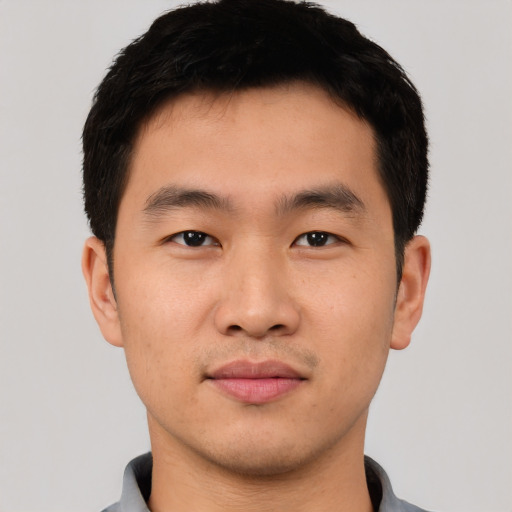 Neutral asian young-adult male with short  black hair and brown eyes