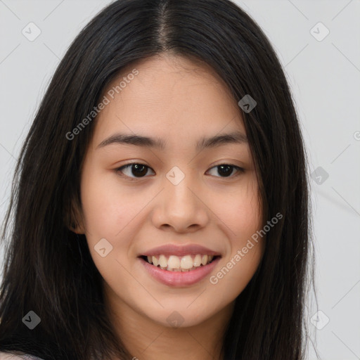 Joyful asian young-adult female with long  brown hair and brown eyes