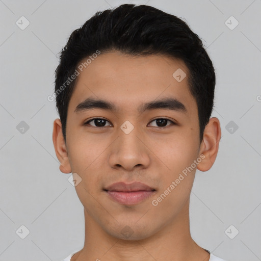 Joyful latino young-adult male with short  black hair and brown eyes