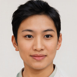 Joyful asian young-adult female with short  black hair and brown eyes