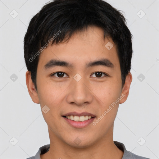 Joyful white young-adult male with short  black hair and brown eyes