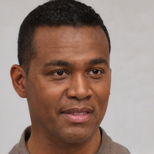 Neutral black young-adult male with short  brown hair and brown eyes