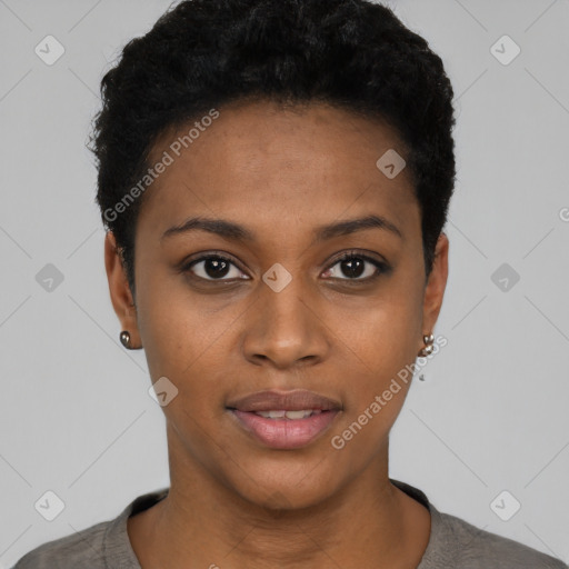 Joyful black young-adult female with short  black hair and brown eyes