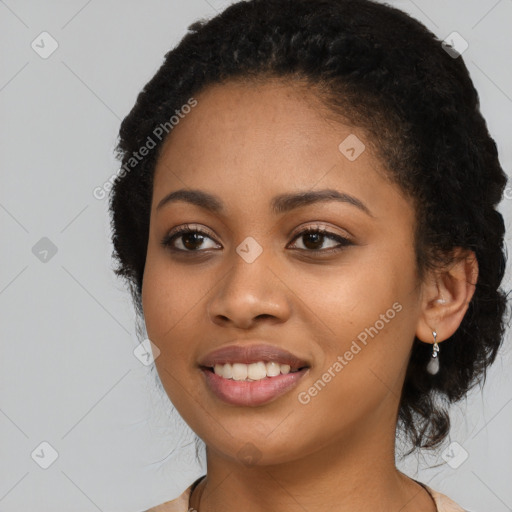 Joyful latino young-adult female with long  black hair and brown eyes