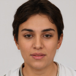 Neutral white young-adult female with short  brown hair and brown eyes