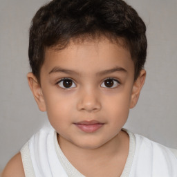 Joyful white child male with short  brown hair and brown eyes