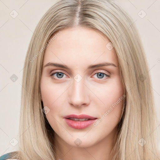 Neutral white young-adult female with long  brown hair and blue eyes