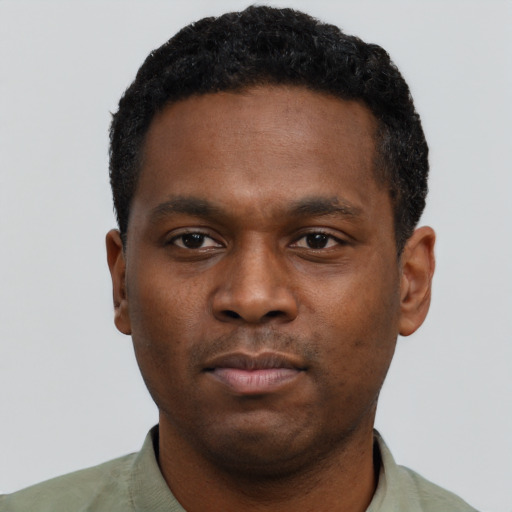 Neutral black young-adult male with short  black hair and brown eyes