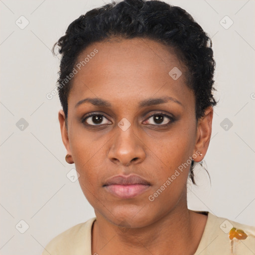 Neutral black young-adult female with short  black hair and brown eyes