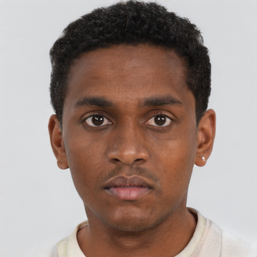 Neutral black young-adult male with short  black hair and brown eyes