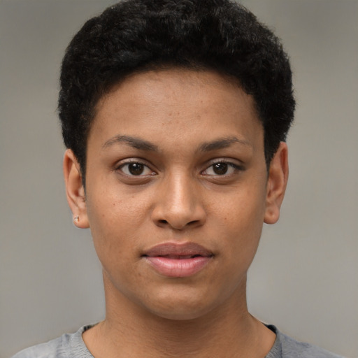 Joyful latino young-adult female with short  black hair and brown eyes