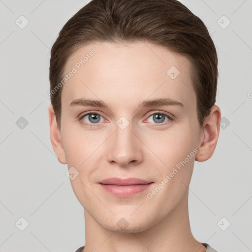 Joyful white young-adult female with short  brown hair and grey eyes