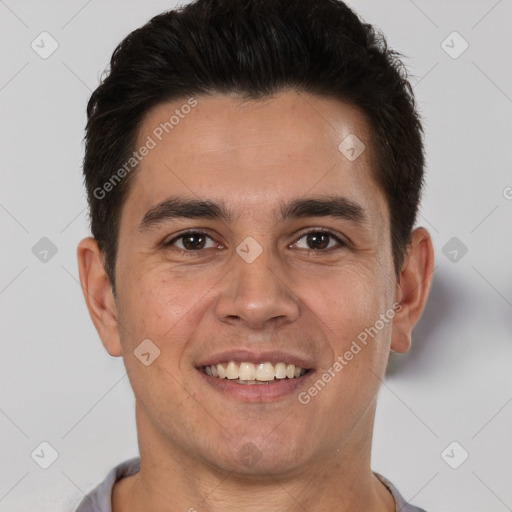 Joyful white young-adult male with short  brown hair and brown eyes