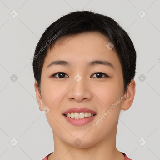 Joyful asian young-adult female with short  black hair and brown eyes