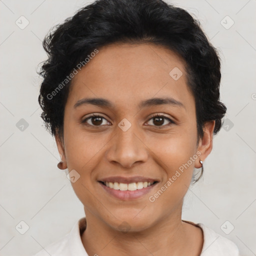 Joyful latino young-adult female with short  black hair and brown eyes