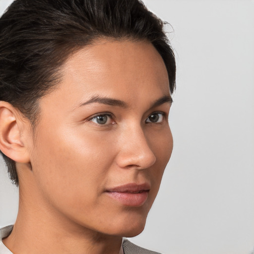 Neutral white young-adult female with short  brown hair and brown eyes