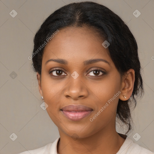 Joyful black young-adult female with medium  black hair and brown eyes