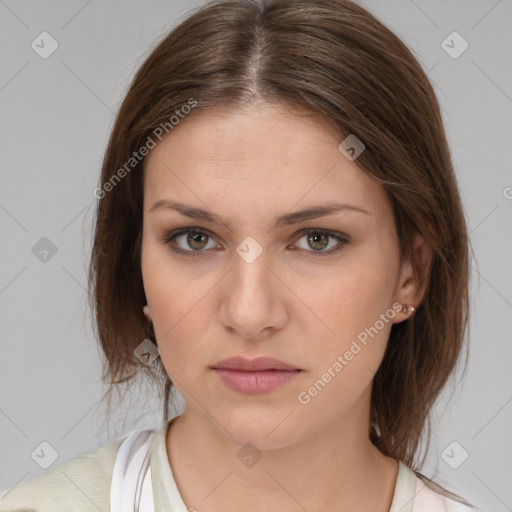 Neutral white young-adult female with medium  brown hair and brown eyes