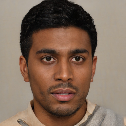 Neutral latino young-adult male with short  black hair and brown eyes