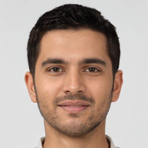Neutral latino young-adult male with short  brown hair and brown eyes