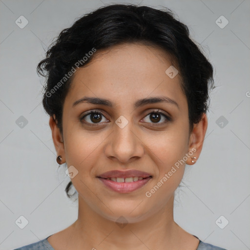 Joyful latino young-adult female with short  brown hair and brown eyes