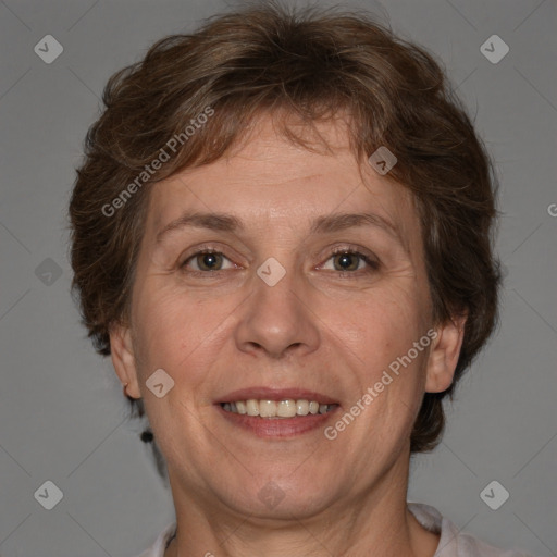 Joyful white adult female with short  brown hair and brown eyes