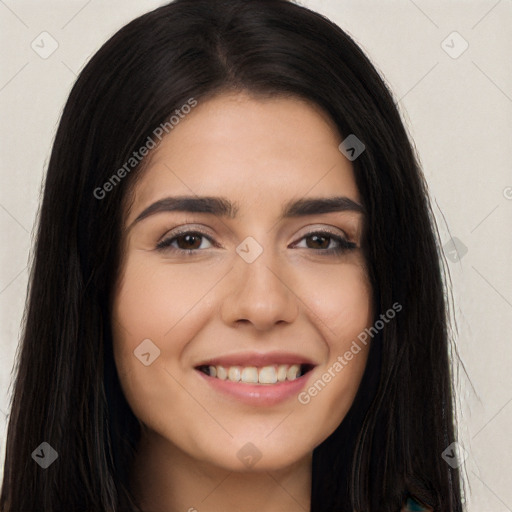 Joyful white young-adult female with long  black hair and brown eyes