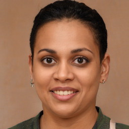 Joyful latino young-adult female with short  brown hair and brown eyes