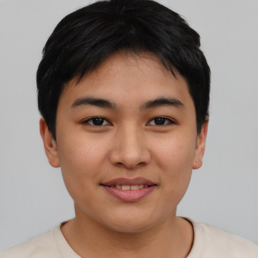 Joyful asian young-adult female with short  black hair and brown eyes