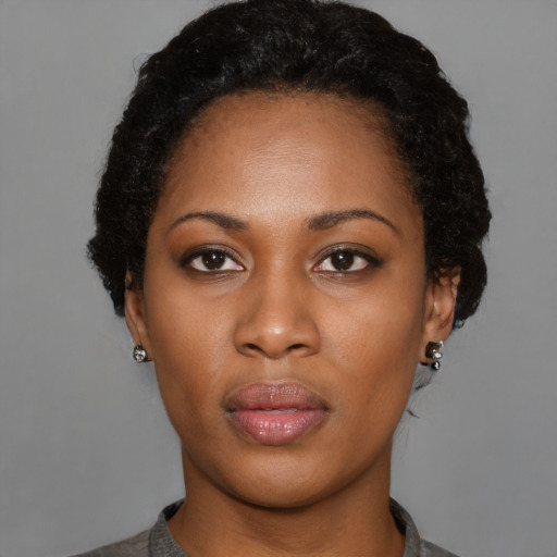 Neutral black young-adult female with short  black hair and brown eyes