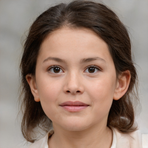 Joyful white child female with medium  brown hair and brown eyes