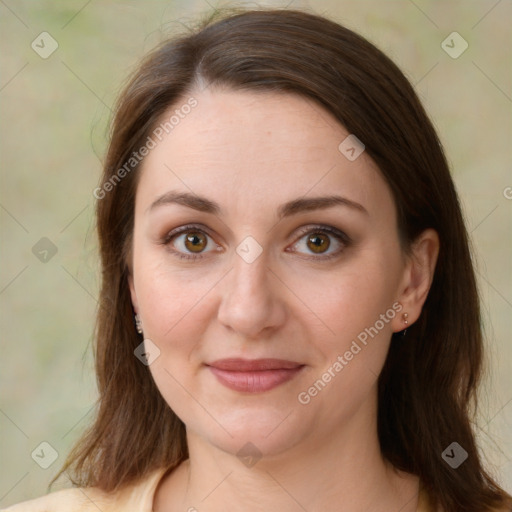 Joyful white young-adult female with medium  brown hair and green eyes