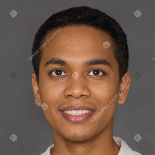 Joyful black young-adult male with short  black hair and brown eyes