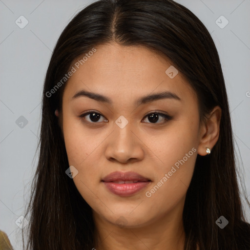 Joyful asian young-adult female with long  brown hair and brown eyes