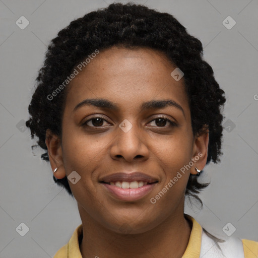 Joyful black young-adult female with short  black hair and brown eyes