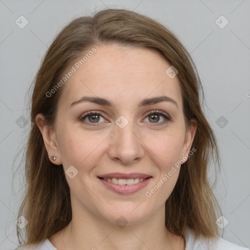 Joyful white young-adult female with medium  brown hair and grey eyes